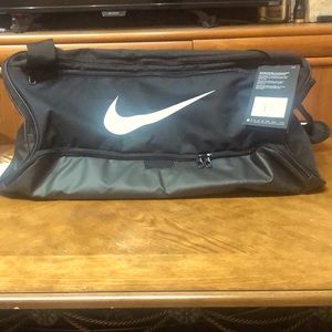 Brand new NIKE duffel bag with tags attach…
